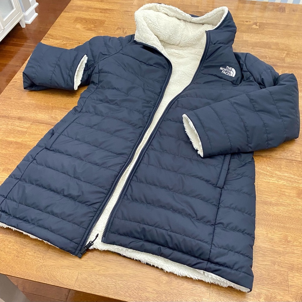 The North Face Women’s Mossbud Insulated Reversible Parka.